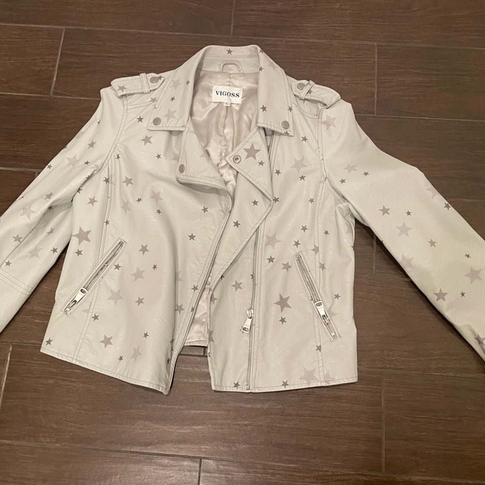 - Super cute Biker Jacket with stars (slight lining tear down inner inseam)
